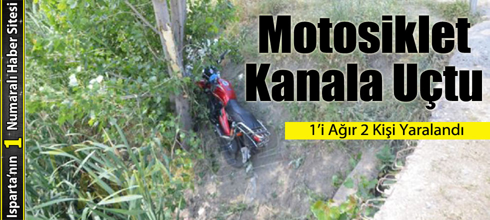 Motosiklet Kanala Uçtu:2 Yaralı